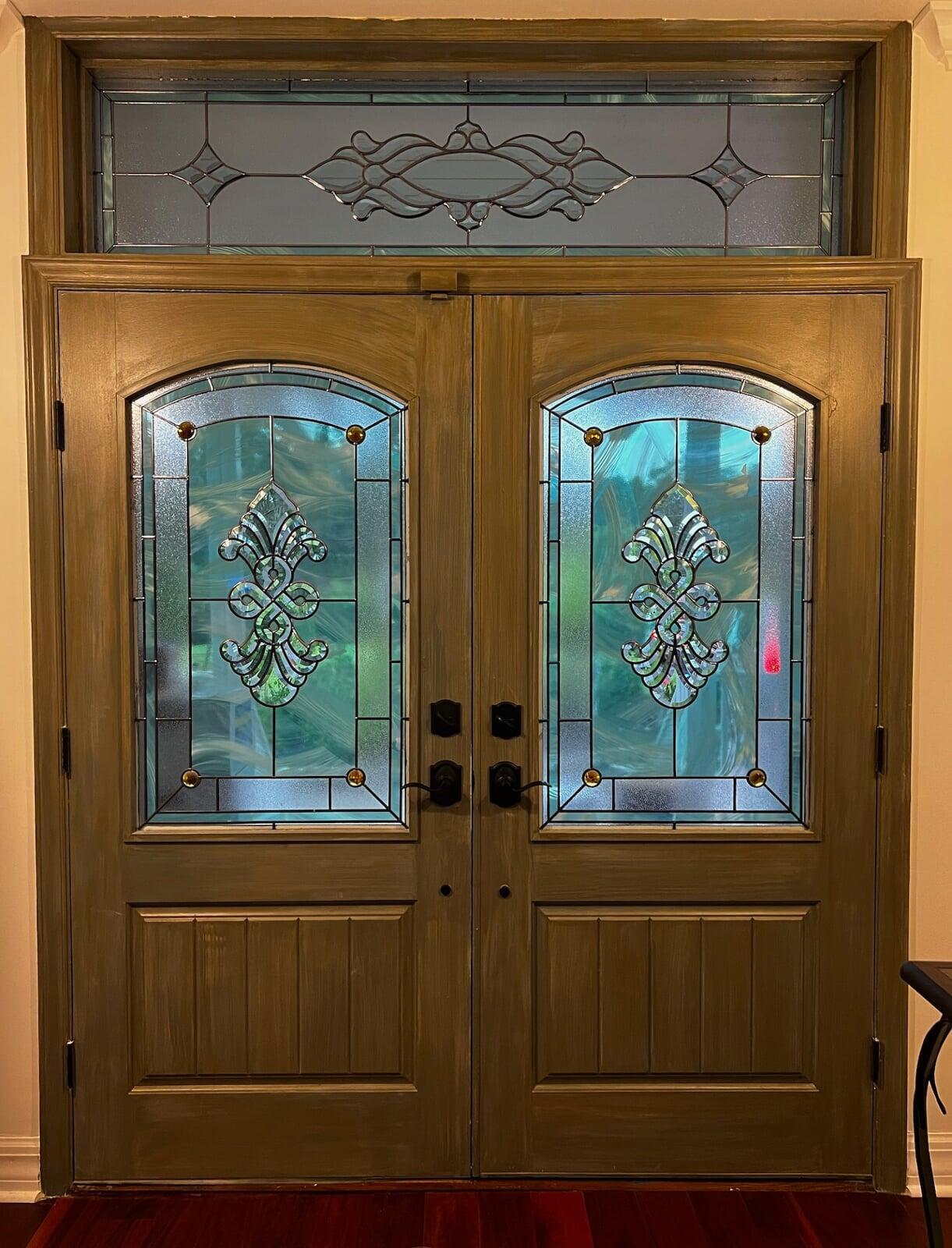 Entry way door, sidelights and transom in traditional stained glass style