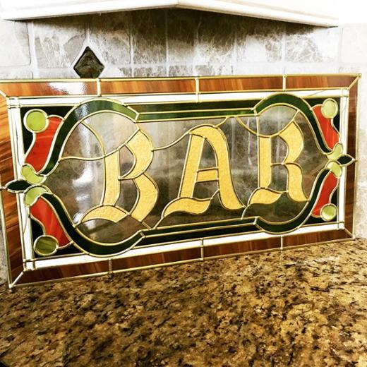 A sample piece from a set of windows for an Irish pub
