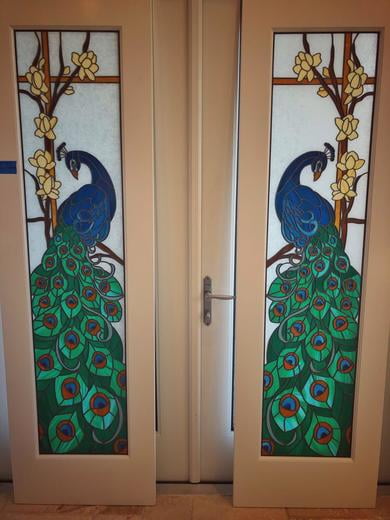 Intricate Peacock Patio Doors